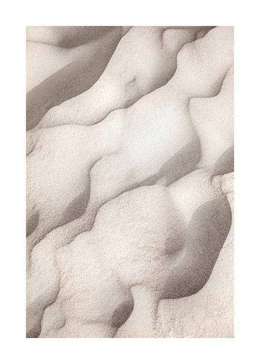 – Fotografie von beigem Sand, der abstrakte Muster bildet